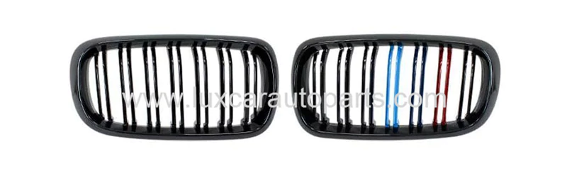 bmw-x6-f16-m-grille-m-color-stripes.webp