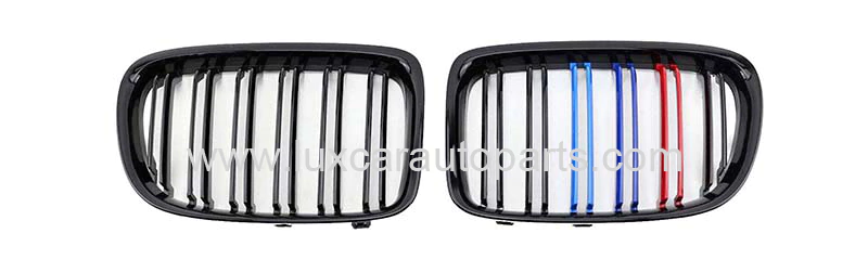bmw-x1-e84-m-grille-m-color-stripes.webp